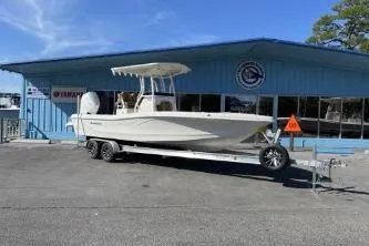The Image of 2026 Ranger 2660 Bay boat on trailer outside dealership. - 0