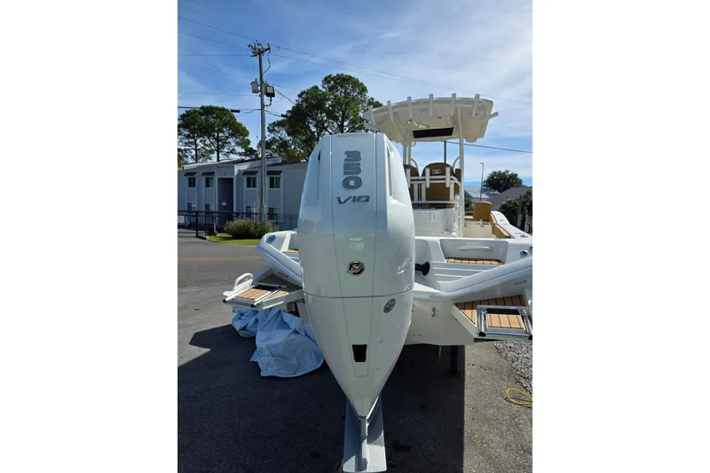 Slide: The Image of Interior view of 2026 Ranger 2660 Bay boat, showcasing storage compartment. - 11