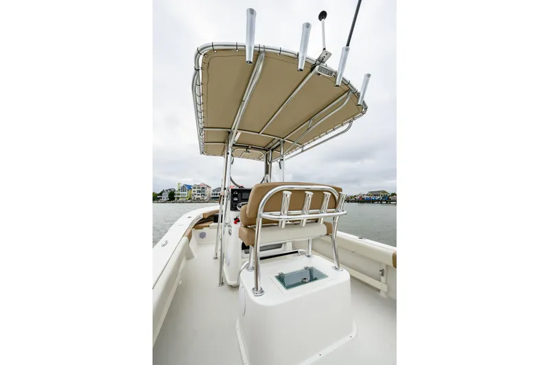 Slide: The Image of 2018 Parker 21 Special Edition boat with T-top on calm water. - 4