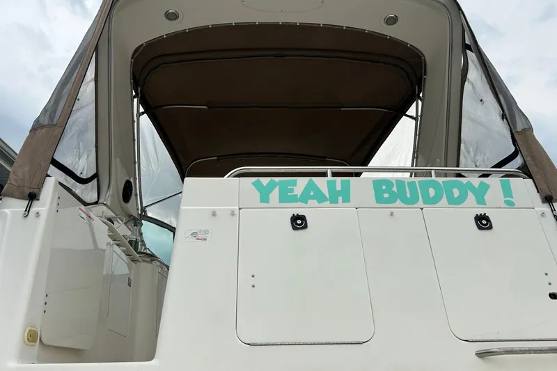 Slide: The Image of 2000 Maxum 3000 SCR boat with "Yeah Buddy!" text on the back. - 31