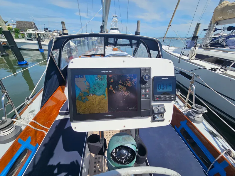 Slide: The Image of Cockpit of 1967 Jensen Cal 36 sailboat with navigation equipment and compass. - 12