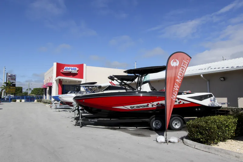 Slide: The Image of 2025 Yamaha Boats AR190 displayed outside dealership with new model banner. - 9