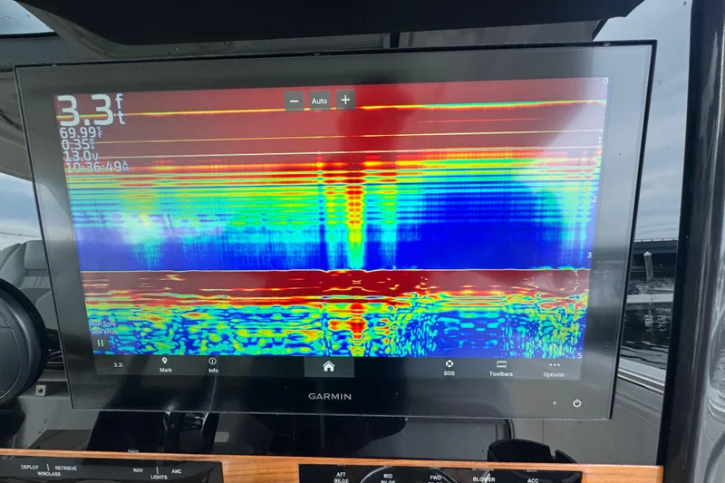 Slide: The Image of Garmin sonar display on 2023 Tiara Yachts 43 LS, showing depth and temperature data. - 50