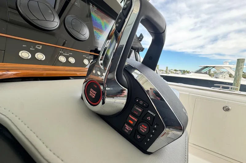 Slide: The Image of 2023 Tiara Yachts 43 LS control panel with advanced navigation features. - 55