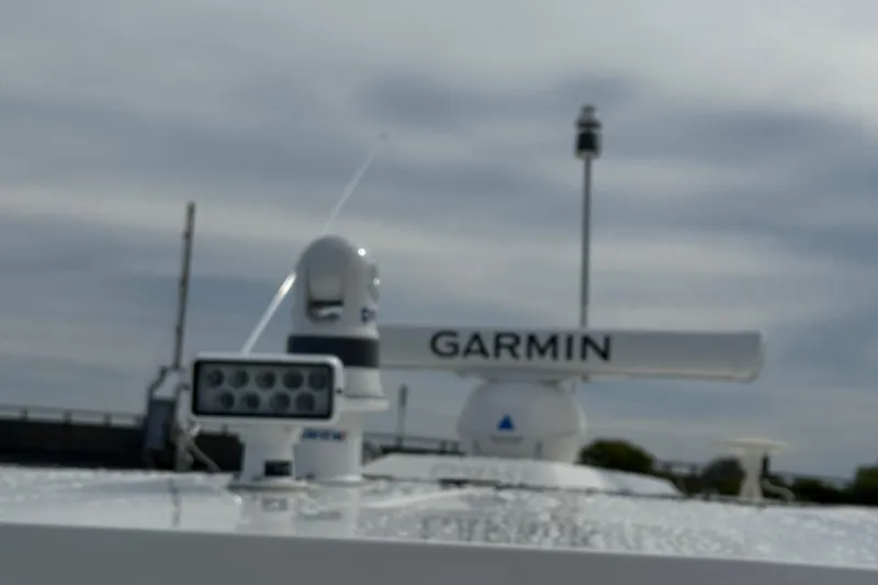 Slide: The Image of 2023 Tiara Yachts 43 LS with Garmin radar equipment on deck. - 60