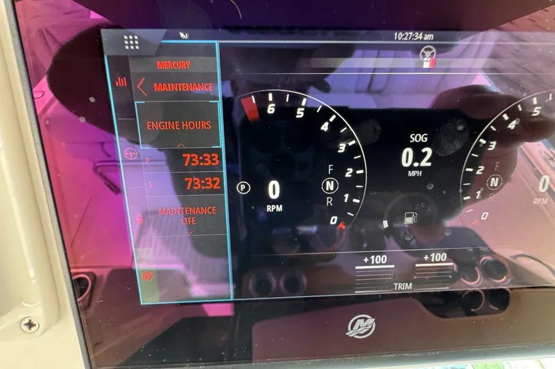 Slide: The Image of Dashboard of 2023 Tiara Yachts 43 LS showing engine hours and maintenance data. - 88