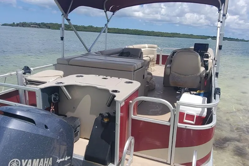 Slide: The Image of Steering console of a 2012 Bennington 22 SSI boat with gauges and controls. - 11