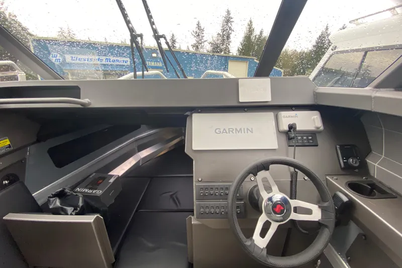 Slide: The Image of Interior of 2026 Stabicraft 2350 Supercab with Garmin equipment. - 11