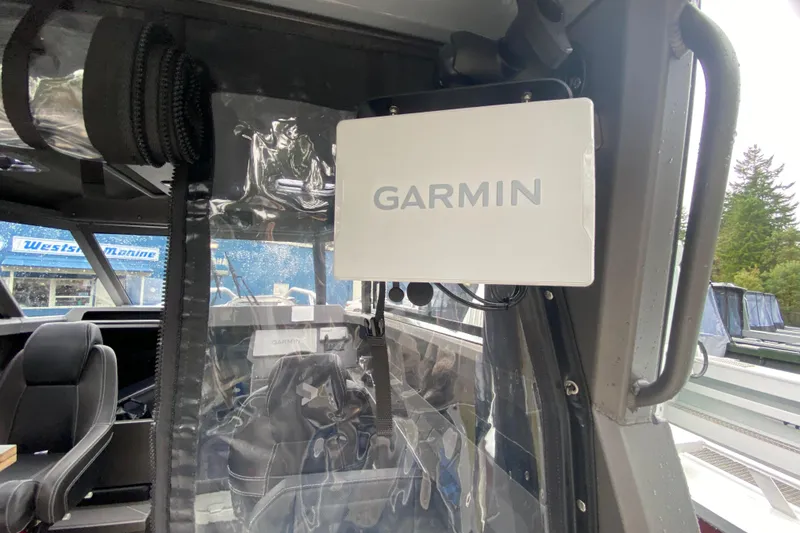 Slide: The Image of Garmin device inside a 2026 Stabicraft 2350 Supercab. - 14