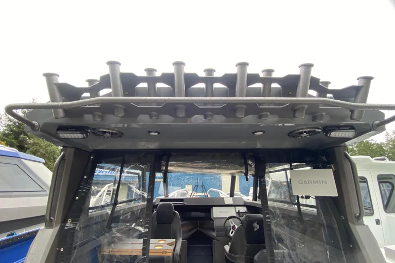 Slide: The Image of Stabicraft 2350 Supercab 2026 with Garmin equipment, interior view. - 15