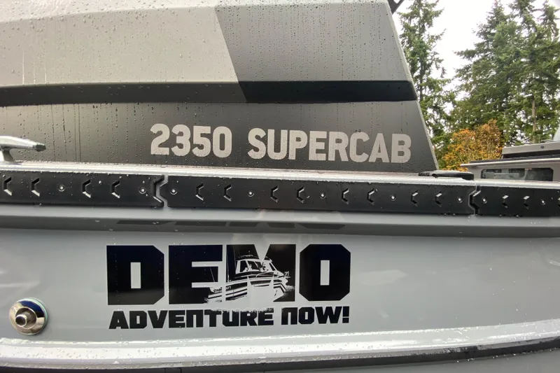Slide: The Image of Stabicraft 2350 Supercab 2026 with "Demo Adventure Now" text. - 7