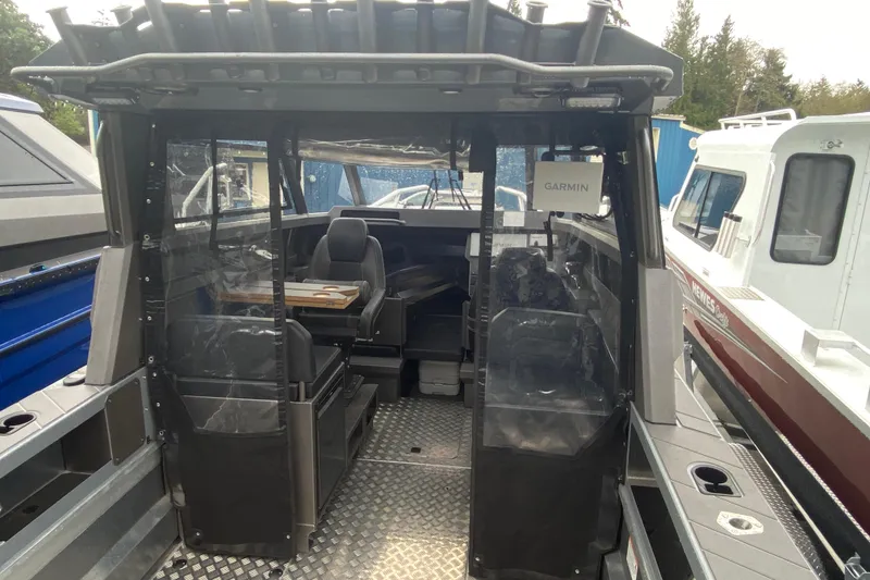 Slide: The Image of Interior of 2026 Stabicraft 2350 Supercab with Garmin equipment. - 9