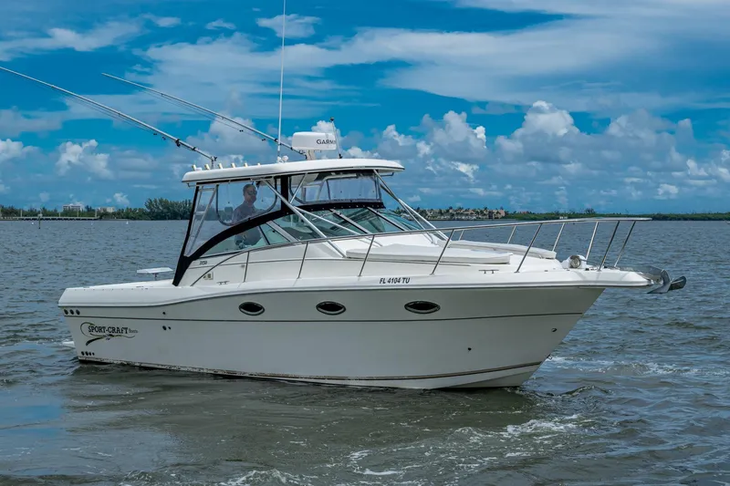 The Image of 2002 Sport-Craft 3150 Sportfish boat cruising on a sunny day. - 0