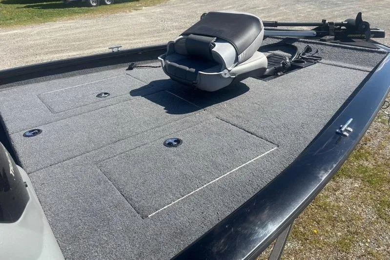 Slide: The Image of 2017 Tracker Pro Team 175 TXW boat deck with seat and storage compartments. - 4