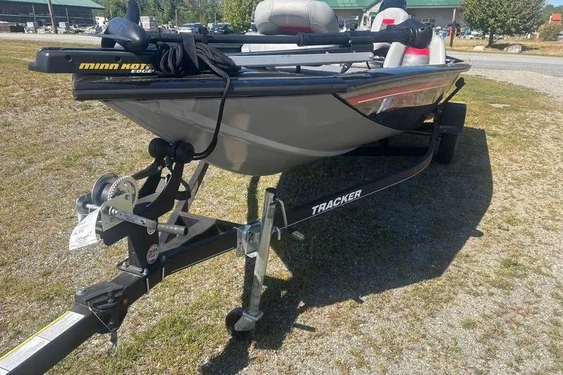 Slide: The Image of 2017 Tracker Pro Team 175 TXW boat on trailer, parked outdoors. - 6