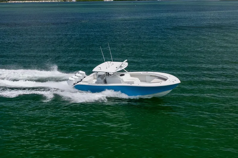 Slide: The Image of 2009 Yellowfin 42 Offshore boat cruising on open water. - 16