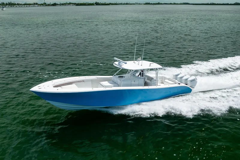 Slide: The Image of 2009 Yellowfin 42 Offshore boat cruising on open water. - 24