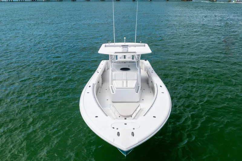 Slide: The Image of 2009 Yellowfin 42 Offshore boat on open water, aerial view. - 4