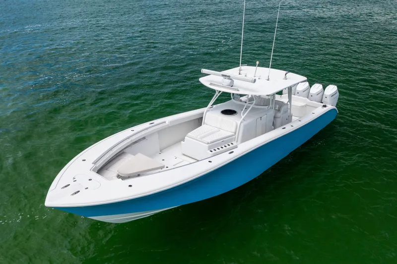 Slide: The Image of 2009 Yellowfin 42 Offshore boat on clear green water. - 5