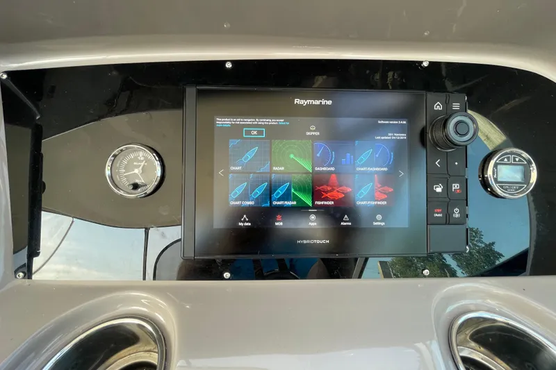 Slide: The Image of Radar system on 2019 Rinker 370 EX boat docked at marina. - 10