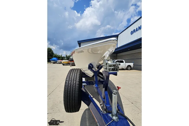 Slide: The Image of 2007 Fountain 42 Lightning boat on trailer under cloudy sky. - 11