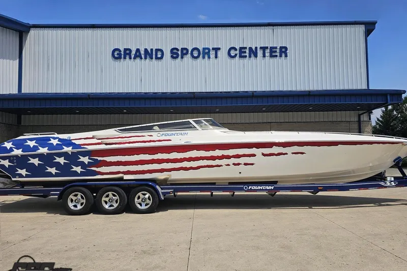 Slide: The Image of 2007 Fountain 42 Lightning boat with American flag design at Grand Sport Center. - 2