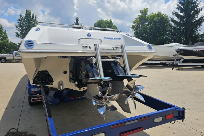 Slide: The Image of 2007 Fountain 42 Lightning boat on trailer, showcasing dual propellers and sleek design. - 27