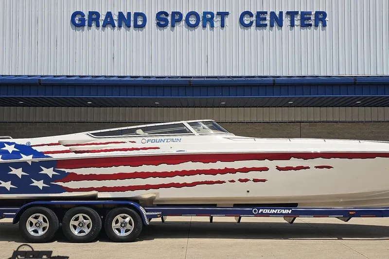 Slide: The Image of 2007 Fountain 42 Lightning boat with American flag design at Grand Sport Center. - 3