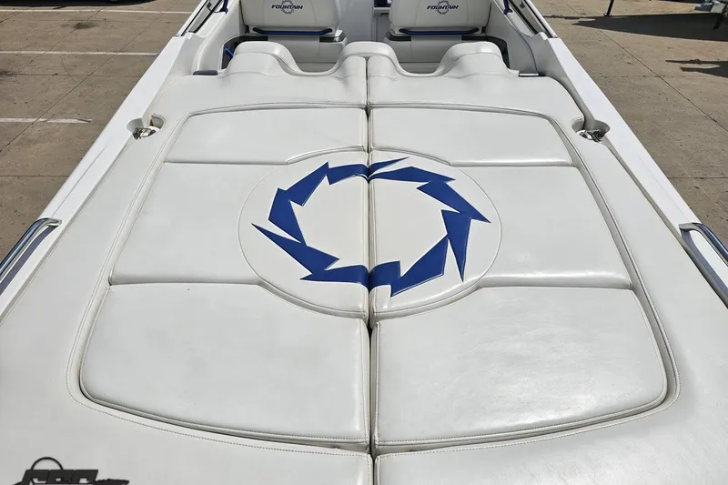 Slide: The Image of 2007 Fountain 42 Lightning boat interior with white upholstery and blue logo design. - 36