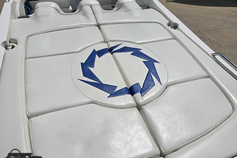 Slide: The Image of 2007 Fountain 42 Lightning boat with white leather seating and blue logo design. - 38