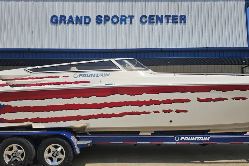 Slide: The Image of 2007 Fountain 42 Lightning boat with red graphics at Grand Sport Center. - 4
