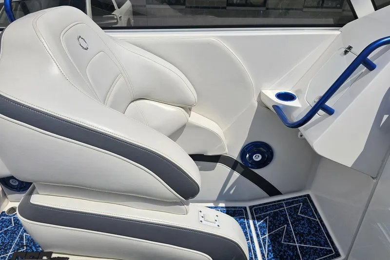Slide: The Image of White and blue interior of 2007 Fountain 42 Lightning boat with cushioned seating. - 52