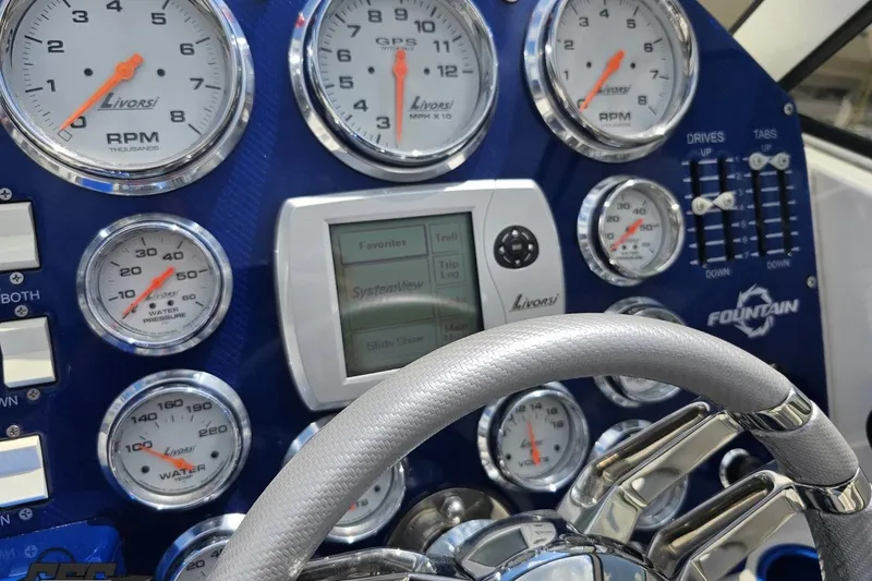 Slide: The Image of Dashboard of 2007 Fountain 42 Lightning boat with Livorsi gauges and steering wheel. - 59