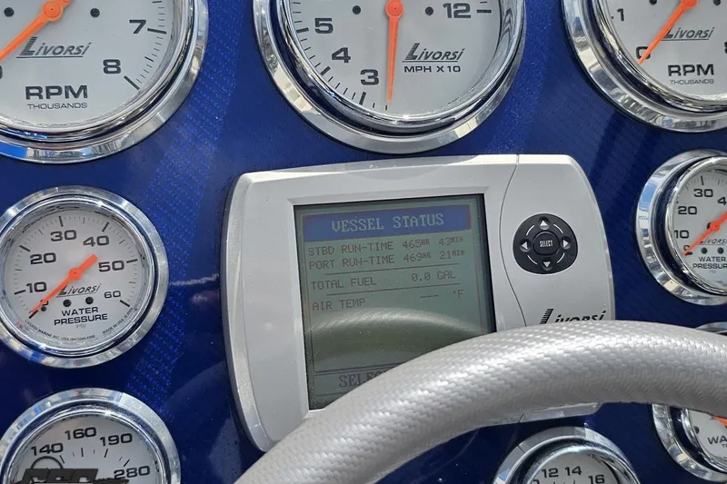 Slide: The Image of Dashboard of a 2007 Fountain 42 Lightning boat with Livorsi gauges and vessel status display. - 60