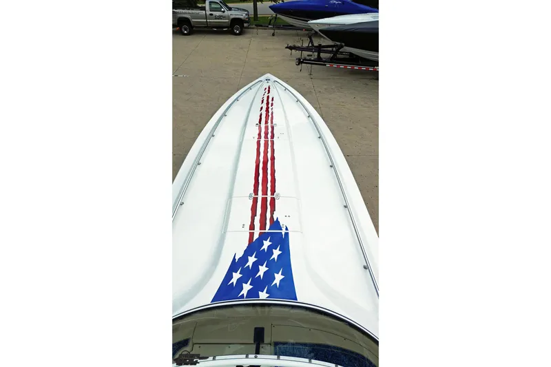 Slide: The Image of 2007 Fountain 42 Lightning boat with American flag design on deck. - 65