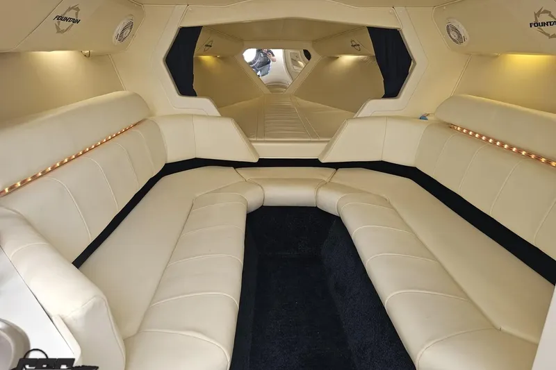 Slide: The Image of Luxurious interior of a 2007 Fountain 42 Lightning boat with plush seating. - 69