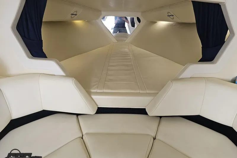 Slide: The Image of Interior of 2007 Fountain 42 Lightning boat with beige leather seating and cozy cabin. - 74