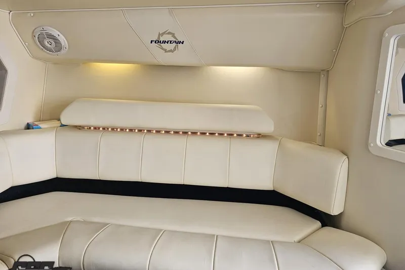 Slide: The Image of Interior of 2007 Fountain 42 Lightning boat with cream leather seating and ambient lighting. - 76