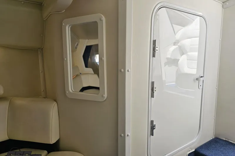 Slide: The Image of Interior of 2007 Fountain 42 Lightning boat with seating and door. - 77