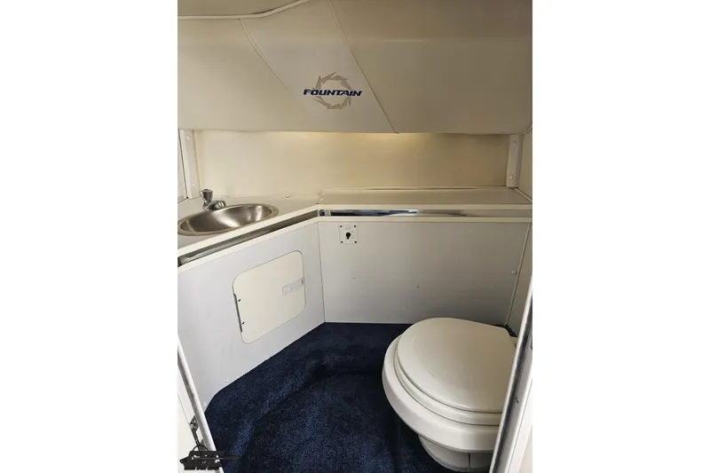 Slide: The Image of 2007 Fountain 42 Lightning boat interior with sink and toilet. - 79
