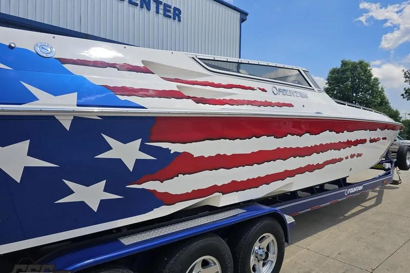 Slide: The Image of 2007 Fountain 42 Lightning boat with American flag design on trailer. - 8