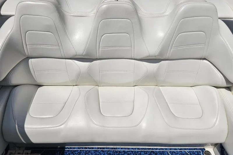Slide: The Image of White leather seating in a 2007 Fountain 42 Lightning boat. - 84