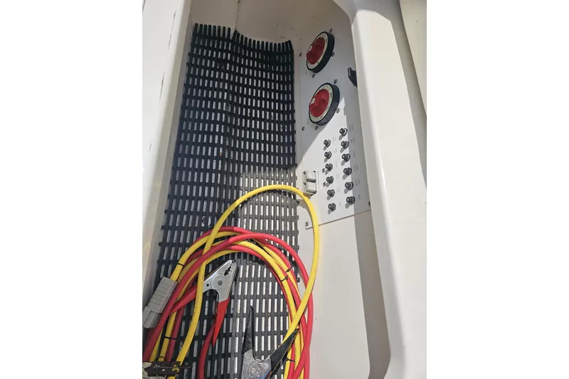 Slide: The Image of Electrical panel and cables in a 2007 Fountain 42 Lightning boat. - 87