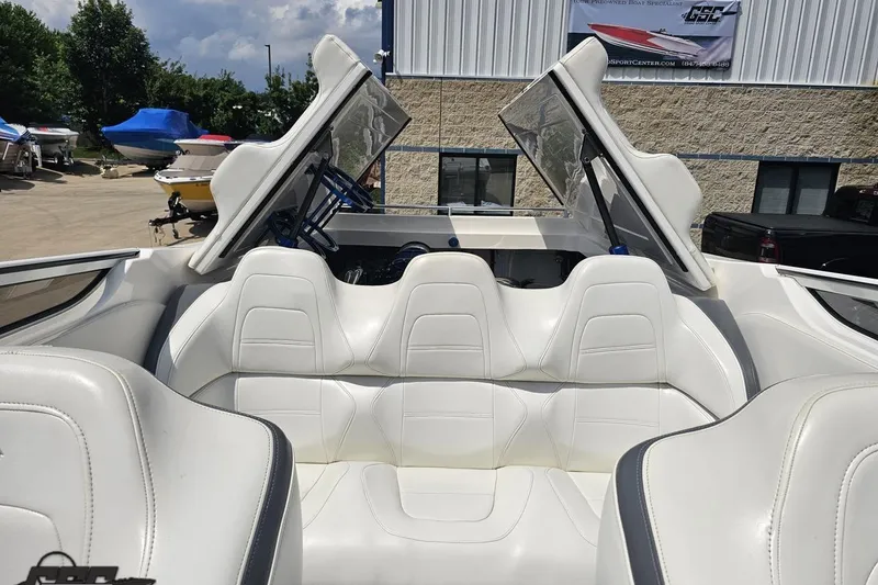 Slide: The Image of 2007 Fountain 42 Lightning boat interior with white leather seating and open cockpit. - 89