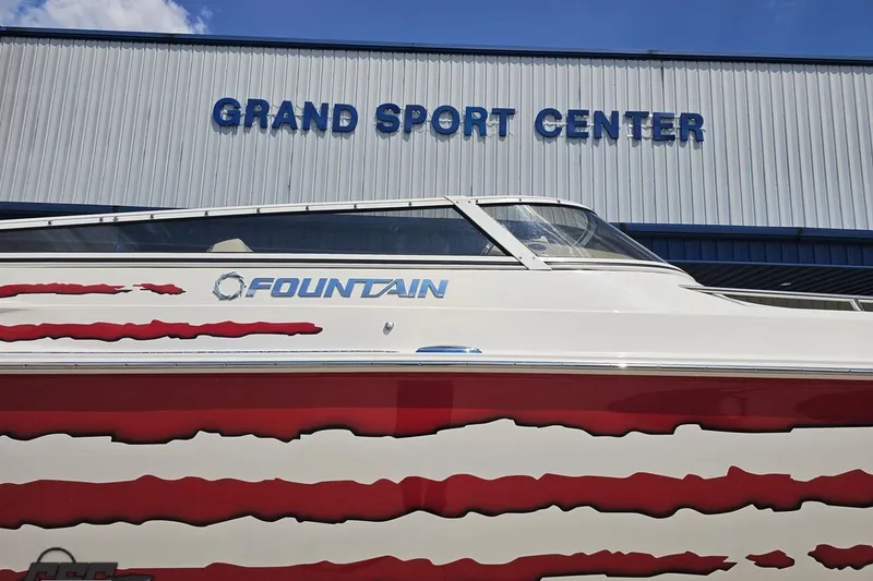 Slide: The Image of 2007 Fountain 42 Lightning boat at Grand Sport Center, featuring sleek design and bold graphics. - 9