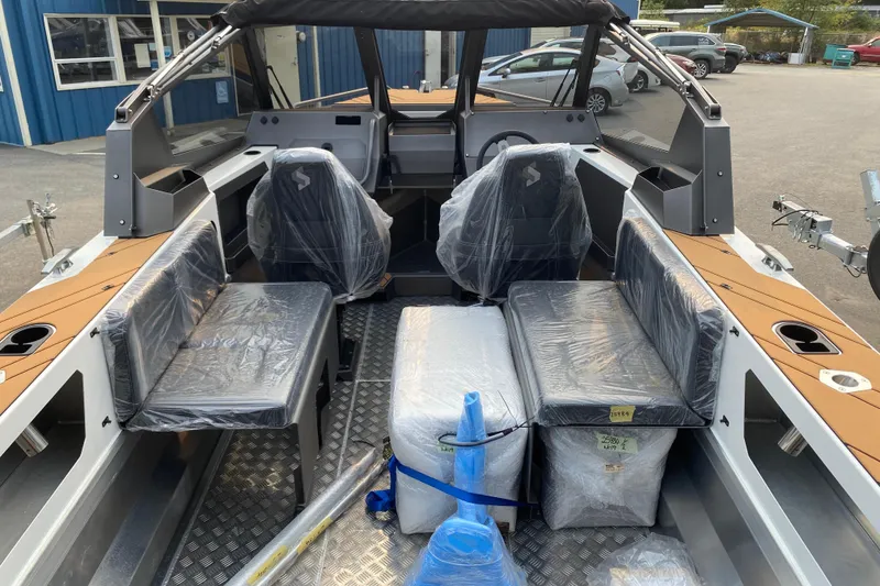 Slide: The Image of 2026 Stabicraft 2050 Trekker boat interior with covered seats and modern design. - 5