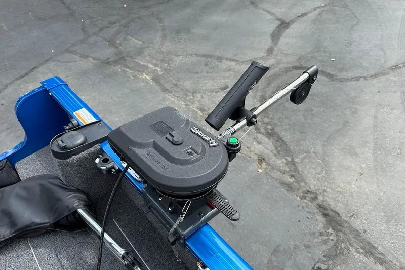Slide: The Image of 2024 Lund 1650 Rebel XL Sport boat with fishing rod holder and equipment. - 15