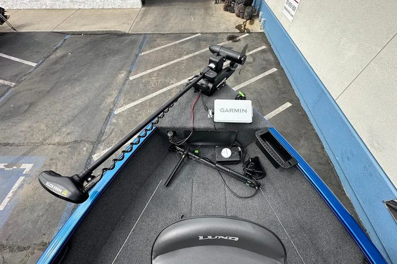 Slide: The Image of 2024 Lund 1650 Rebel XL Sport boat with Garmin equipment and Minn Kota trolling motor. - 24