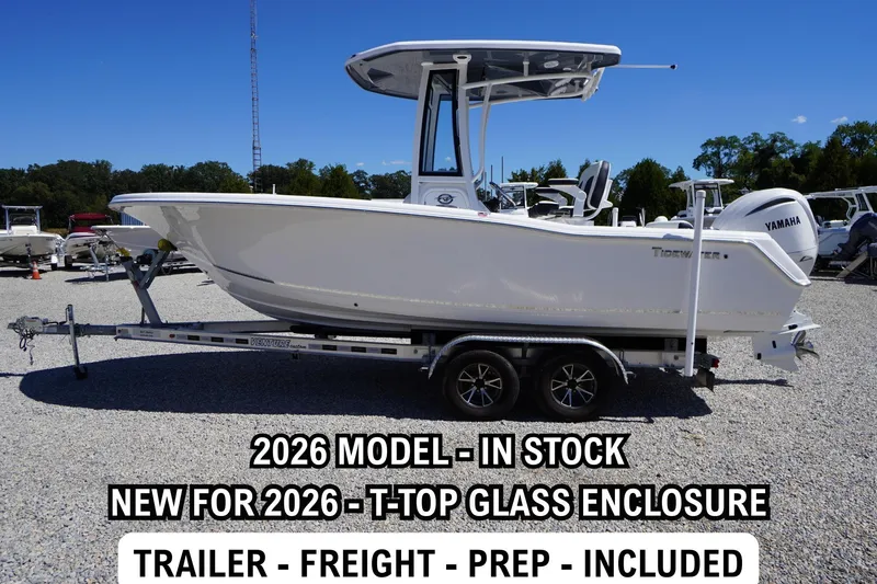 The Image of 2026 Tidewater 220 CC Adventure boat with T-Top glass enclosure on trailer. - 0