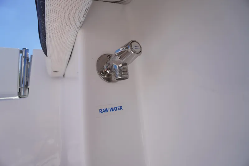 Slide: The Image of Raw water outlet on 2026 Tidewater 220 CC Adventure boat. - 42